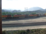 A BNSF train releasing the brakes going down the hill